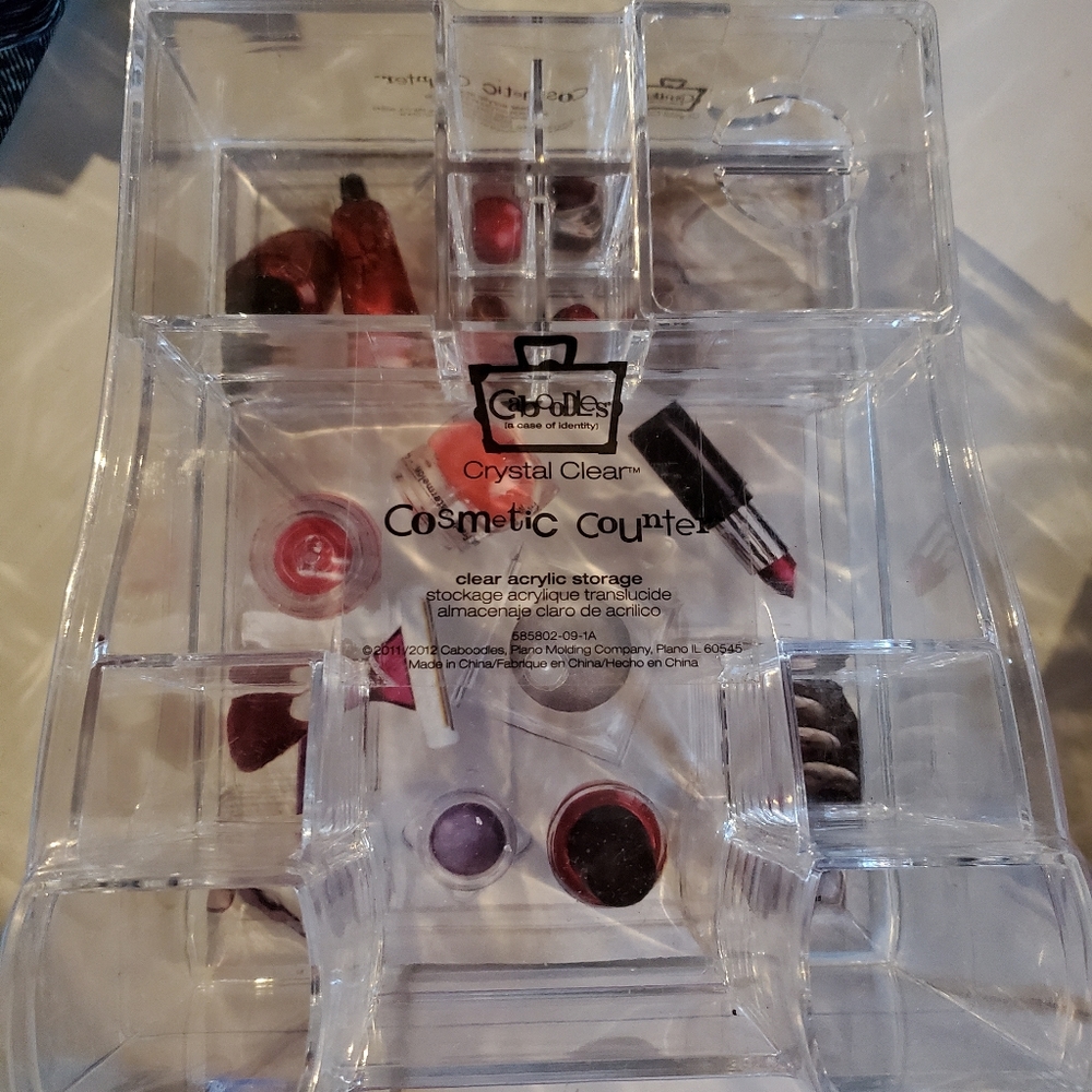 Caboodles Makeup Organizer and various facial products